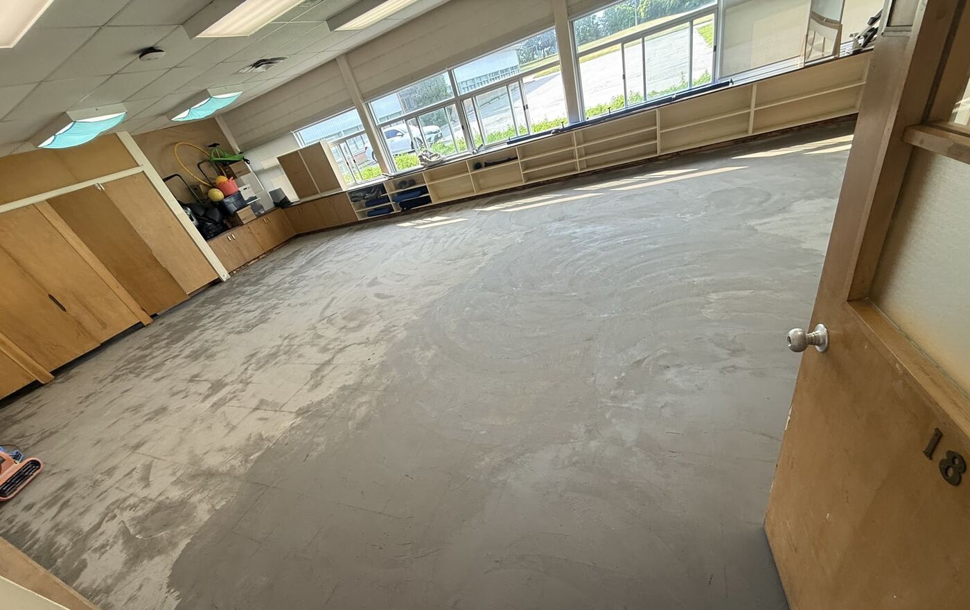 Bare concrete subfloor before flooring installation