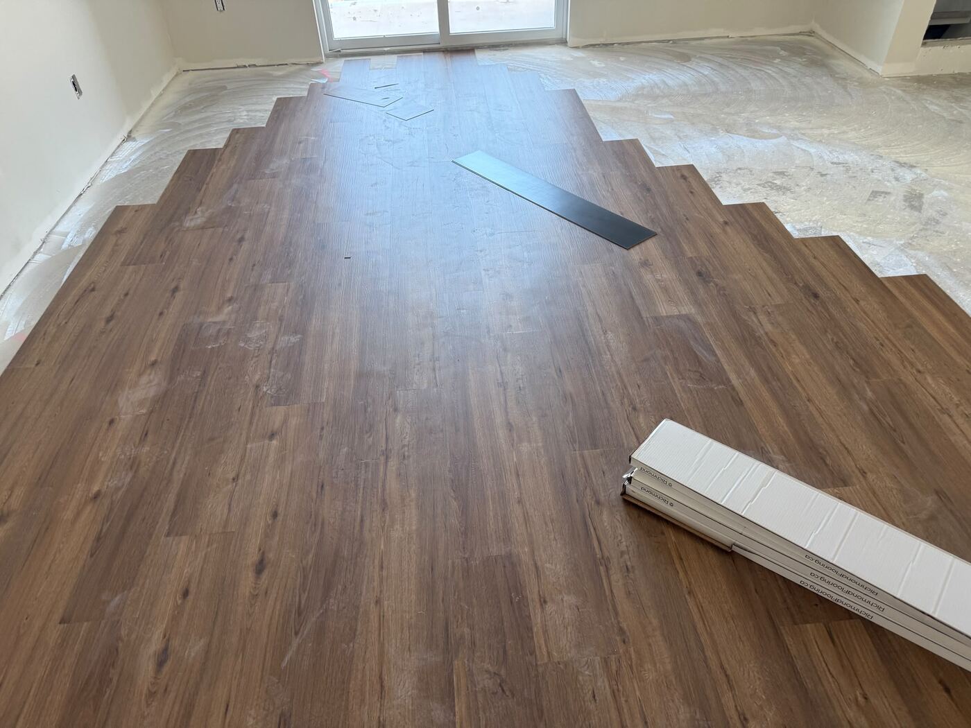 LVT plank flooring being installed